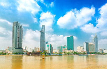 Skyscrapers along river with architecture office towers, hotels, center cultural and commercial development country most in Ho Chi Minh city, Vietnam