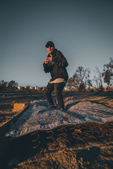 Beautiful sunset, golden hour, man in a path