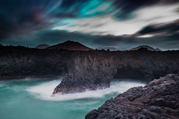 the boiling pots of lanzarote, los hervideros. with long delay image.