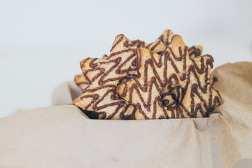 Star shape cookie with chocolate and sugar on the top