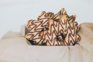 Star shape cookie with chocolate and sugar on the top