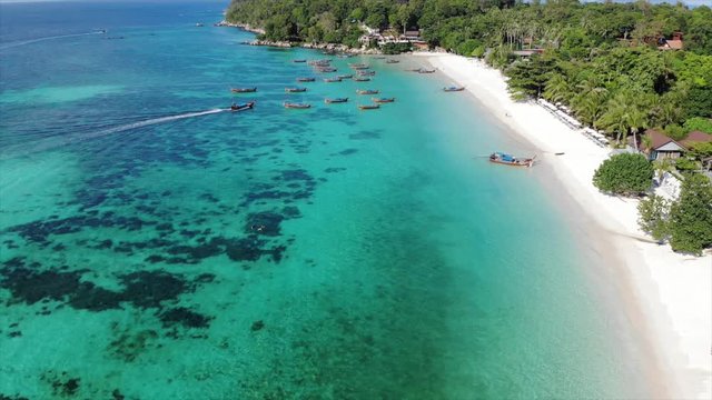 drone scene from thailand koh lipe island. very clean & clear the sea. such beautiful to travel. relax, release stress and escape from city lift