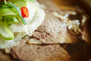 Vietnamese rice noodle soup with beef 