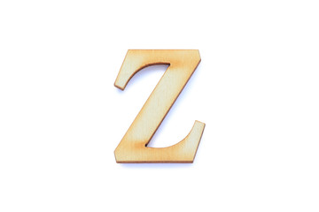 Alphabet letter wooden font with shadow isolated over white background. English flat wood character Z.