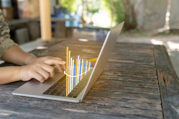 Business analytics and financial concept, Plans to increase business growth and an increase in the indicators of positive growth in 2020 floating above digital laptop computer.