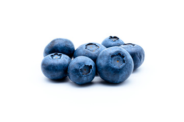 Fresh natural blueberries isolated on white background. Daily rate of vitamins in small purple berries.