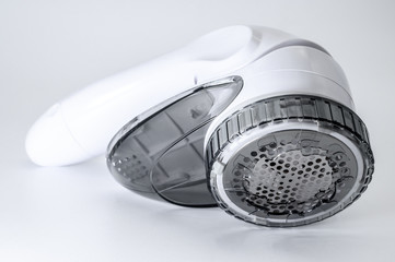 Machine to remove the pellet and spools from the clothes isolated on white background.