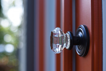 Close up on a clear door knob.