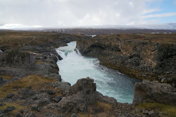 Fototapeta na wymiar Rushing, powerful river in Iceland