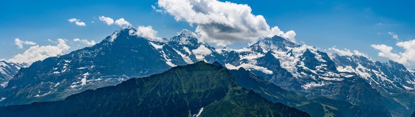 Fototapeta na wymiar Switzerland, Panoramic view on Eiger, Monch and Jungfrau from Schynige Platte