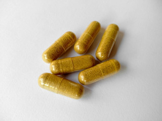 Herb capsule or Herbal capsule on white background. Medicine and pills capsules isolated on white background.