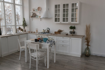 Photo of a Scandinavian minimalist style kitchen interior depicting winter holidays.