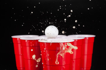 The arrangement of red plastic cups for game of beer pong - obrazy, fototapety, plakaty