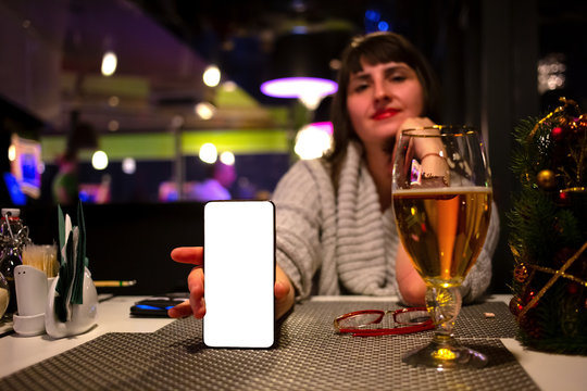 woman showing smart phone