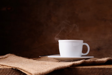 Coffee cup on a rustic background