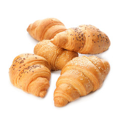 Tasty croissants on white background