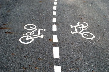 Fototapeta premium white bicycle sign on alphart road