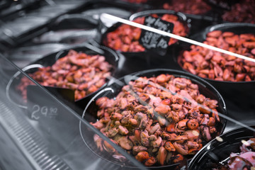 Different seafood on display, closeup. Wholesale market