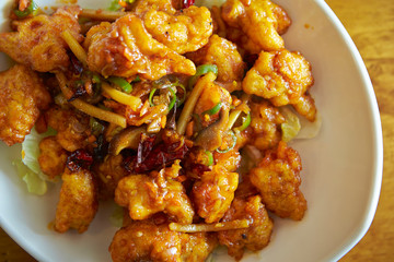 Fried chicken and vegetable with spicy sauce 