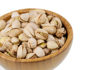 Background of delicious pistachios isolated on white background