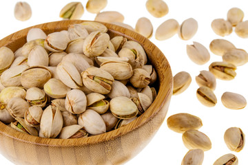 Background of delicious pistachios isolated on white background