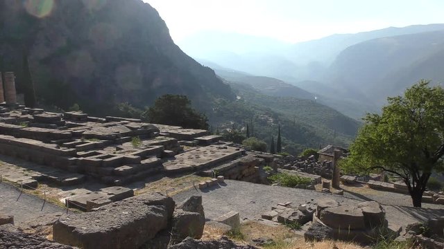 Apollo Temple in Delphi archaeological site at the Mount Parnassus. Delphi is famous by the oracle at the sanctuary dedicated to Apollo. UNESCO World heritage. Greece