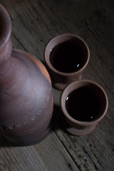 Clay bottle with wine