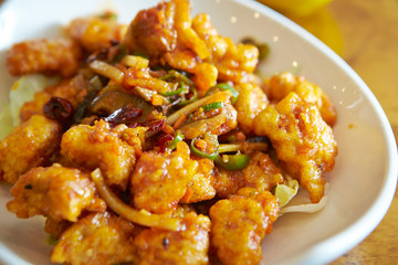 Fried chicken and vegetable with spicy sauce 