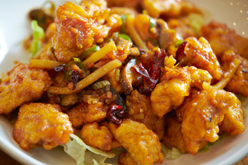 Fried chicken and vegetable with spicy sauce 