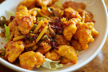 Fried chicken and vegetable with spicy sauce 