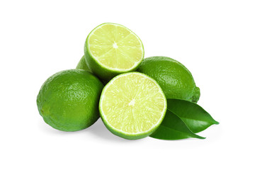 Fresh ripe green limes isolated on white