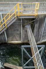 Conduits Cross the Fish Ladder at the Bonneville Dam, Washington, USA