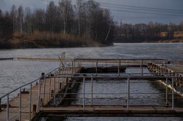 metal pier on the background of the forest