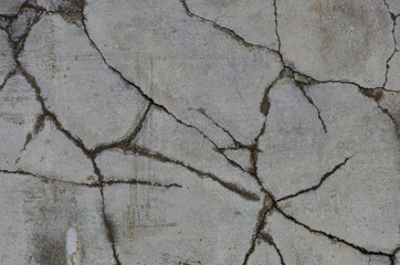 Obraz premium old gray cracked concrete wall