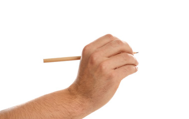 Man holding pencil on white background, closeup of hand
