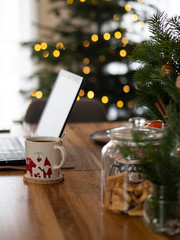 Office laptop. and workspace. Behind a beautiful Christmas bokeh background