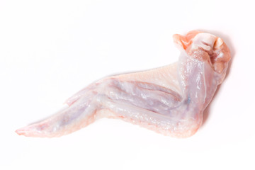 Raw chiken meat on a light background
