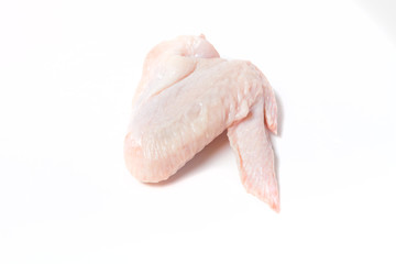 Raw chiken meat on a light background