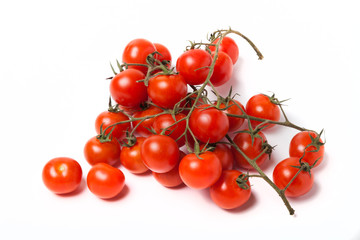 Fresh tomatoes on branch on light background - 310594584