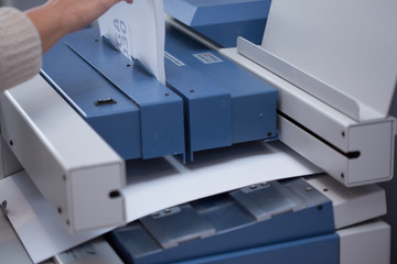 Production and gluing of books.