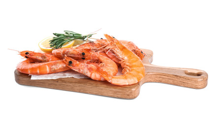 Delicious cooked shrimps served with lemon and rosemary on white background