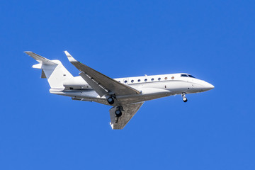 Private airplane preparing to land at an airport in California