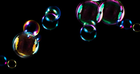 Naklejka premium Soap bubble with black background