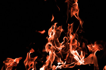 Bonfire on a black background. Fire pattern. Tongues of flame on black isolated background