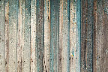 Old wooden boards on the fence as a background