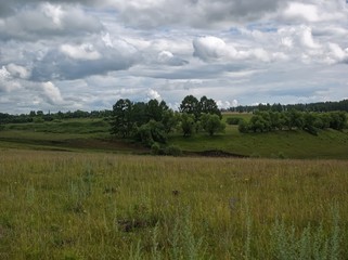 landscape of Central Russia on a cloudy day, summer.