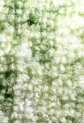 Fabric on a green carpet as an abstract background