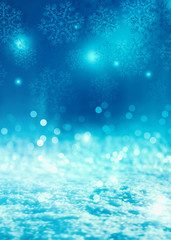 Brilliant festive winter background with neon glow. Falling snowflakes, blurry lights. Magic particles