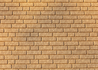Obraz premium Wall of yellow bricks as an abstract background