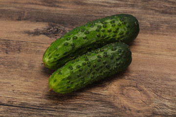 Ripe fresh green two cucumbers